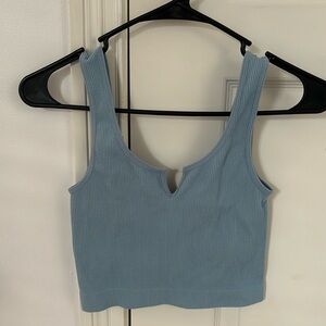 Notch crop tank